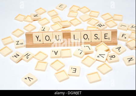 'You Lose' written in scrabble tiles Stock Photo