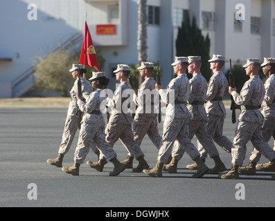 Marines with Ammunition Company, 1st Supply Battalion, Combat Logistics Regiment 15, 1st Marine Logistics Group, march in unison during a quarterly drill competition aboard Camp Pendleton, Calif., Oct. 18, 2013. The event was designed to sharpen the basic Stock Photo