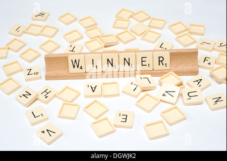 'Winner' written in scrabble tiles Stock Photo