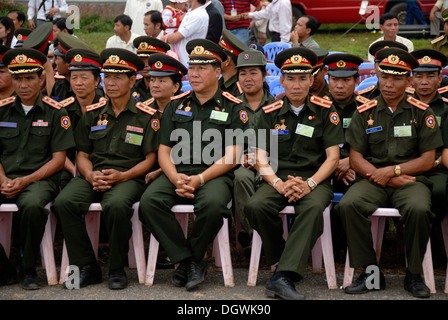 Festival, Laotian police officers in uniform as spectators, Muang Xai, Udomxai province, Laos, Southeast Asia, Asia Stock Photo