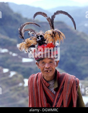 Ifugao man, a member of an ethnic group wearing a traditional costume, Banaue Rice Terraces, also known as musuan peak Stock Photo