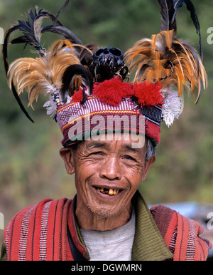 Ifugao man, a member of an ethnic group wearing a traditional costume ...