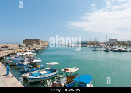 Fishing harbour, fishing boats, the old port with the Koules fortress, Rocca al Mare, Heraklion or Iraklion, Crete, Greece Stock Photo