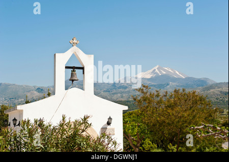 Small church with a bell tower, at back Mt Psiloritis, 2456m, highest mountain in Crete, Timios Stavros, Mount Ida, Crete Stock Photo