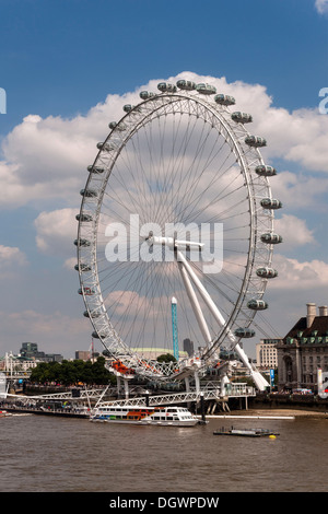 London Eye Ferris wheel, Thames, cloudy sky, London, England, United Kingdom, Europe Stock Photo