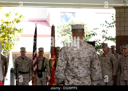 Brig. Gen. Daniel D. Yoo, commanding general, I MEF (Fwd), stands in front of the colors during I MEF (Fwd) reactivation ceremony aboard Camp Pendleton Calif., Oct. 23. During the ceremony, Brig. Gen. Yoo and Sgt. Maj. Berry officially uncased the units c Stock Photo