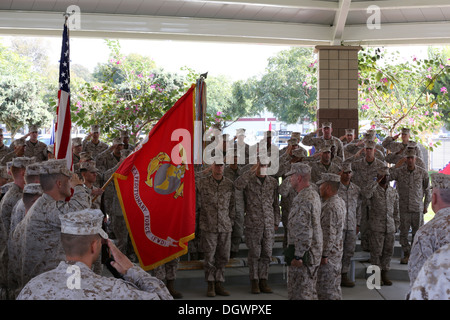 Brig. Gen. Daniel D. Yoo, commanding general, I MEF (Fwd), and Sgt. Maj. Douglas E. Berry, sgt. maj. I MEF (Fwd), salute the colors as the national anthem plays during I MEF (Fwd) reactivation ceremony aboard Camp Pendleton Calif., Oct. 23. During the cer Stock Photo