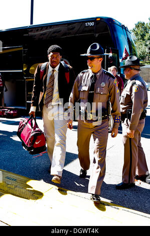 October 26, 2013: Florida State Seminoles quarterback Jameis Winston walks with a police escort into the stadium before the start of the game between the NC State Wolfpack and the Florida State Seminoles at Doak S. Campbell Stadium. Stock Photo