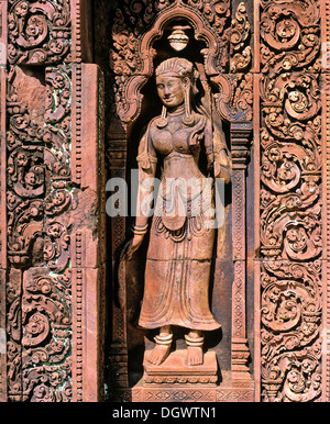 Devata statue made of red sandstone, Banteay Srei Temple, Angkor, Siem Reap, Siem Reap Province, Cambodia Stock Photo