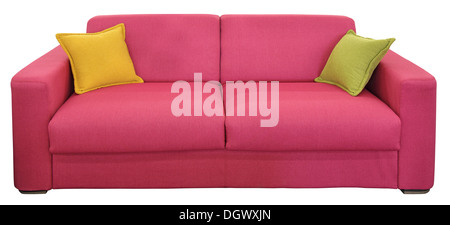 Red two-seat sofa with pillows, isolated on white background Stock Photo