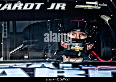 Martinsville, Virginia, USA. 26th Oct, 2013. October 26, 2013: Sprint Cup Series driver Dale Earnhardt Jr. (88) sits in his car prior to the start of practice for the Sprint Cup Series Goody's Headache Relief Shot 500 at Martinsville Speedway, Martinsville, VA. Credit:  csm/Alamy Live News Stock Photo