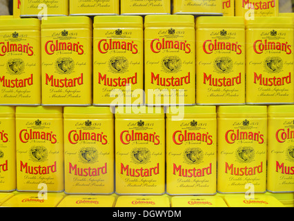 Cans of Colman Mustard in window of Colman's Mustard Shop & Museum, The Royal Arcade, Norwich, Norfolk, England, United Kingdom Stock Photo