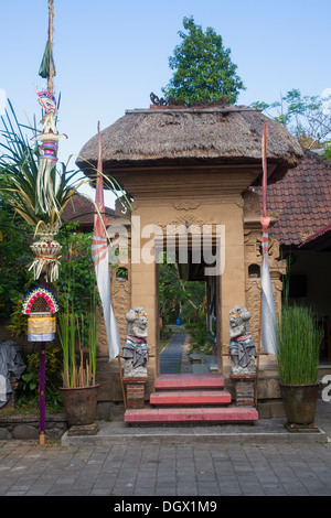 House entrance religious offerings Ubud Bali Asia offerings offer temple protect protection Gods spirits evil belief tradition Stock Photo