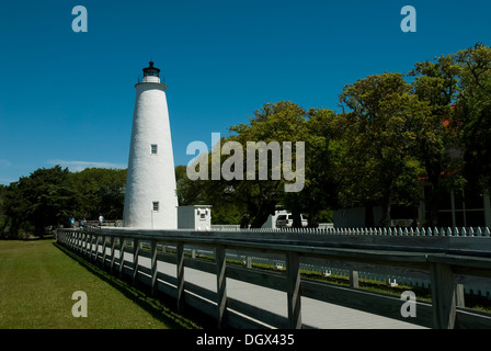 Ocracoke Island Lighthouse against a deep blue sky Stock Photo