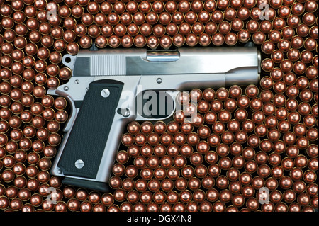 Pistol - gun, bullets and cartridges Stock Photo