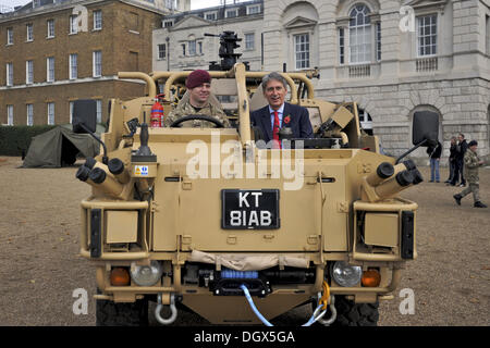 London, UK. 26th Oct, 2013. Philip Hammond MP, Secretary of State for Defence, sitting in a Coyote High Mobility Vehicle at the Reserves recruitment event in Horse Guards Parade. © Michael Preston/Alamy Live News Stock Photo
