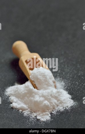 baking soda on black background Stock Photo