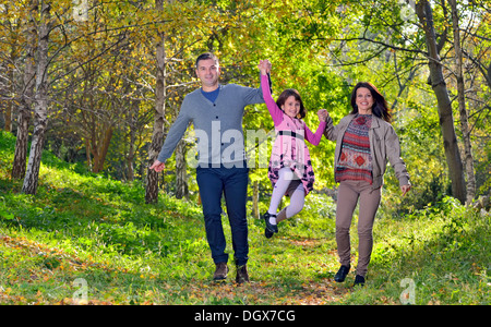 happy young family spending time outdoor Stock Photo