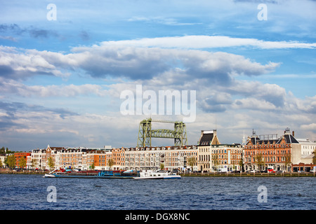 Terraced apartment houses along the river in Rotterdam city centre, Netherlands. Stock Photo
