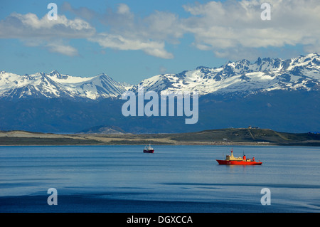 Red icebreaker on Beagle Channel, Ushuaia, Tierra del Fuego, Patagonia, Argentina, South America Stock Photo