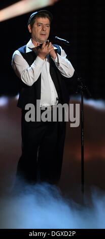 Magdeburg, Germany. 26th Oct, 2013. Musician Michael Hirte performs onstage during the German television live broadcast music show 'Willkommen bei Carmen Nebel' (Welcome at Carmen Nebel) at the Getec-Arena in Magdeburg, Germany, 26 October 2013. Photo: Jens Wolf/dpa/Alamy Live News Stock Photo