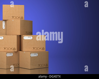 Pile of cardboard boxes on a blue background. Stock Photo