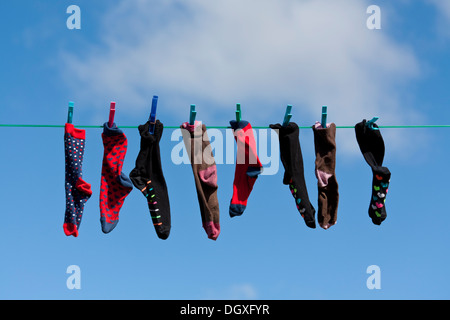 Child socks on a line Stock Photo