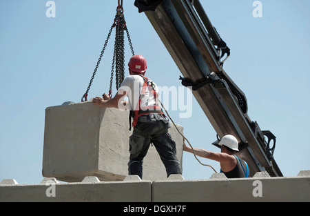 stacking concrete blocks stacking concrete blocks