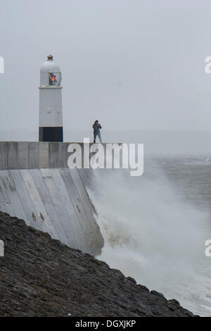 Porthcawl, Wales, UK. October 27. Strong winds at Porthcawl, South Wales as a major atlantic storm moves across the UK. The stormy weather will continue into Monday with winds gusting at up to 80mph.  Matthew Horwood / Alamy Live News Stock Photo