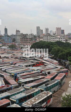 Dhaka, Bangladesh. 27th Oct, 2013. Buses are parked at an inter-district bus during a nationwide strike called by the opposition Bangladesh Nationalist Party (BNP) in Dhaka on October 27, 2013. Three people were killed in nationwide clashes as Bangladesh's opposition began a strike to demand the prime minister quit and make way for polls under a caretaker government. Stock Photo