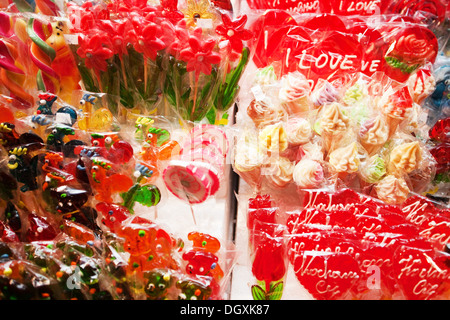 colorful lollipops suckers displayed for sale Stock Photo