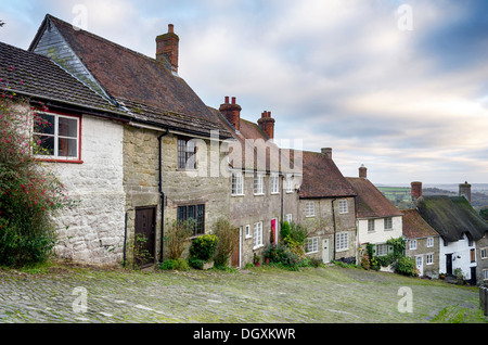 Row of quaint English cottages at Gold Hill in Shaftesbury in Dorset. Stock Photo