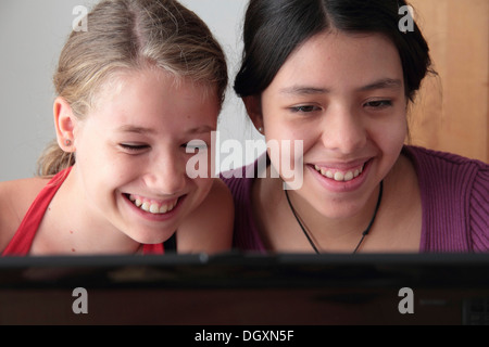 Teenagers on a laptop computer Stock Photo