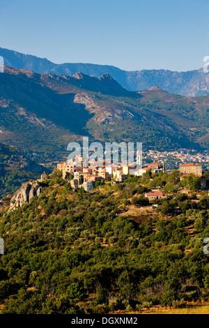 Village of Montemaggiore ( Montegrosso ) with the Monte Grosso range, Haute-Corse department, Corsica, France Stock Photo