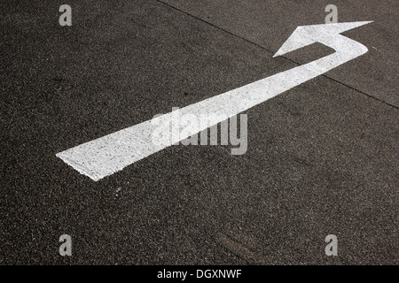 Left turn arrow on asphalt, road Stock Photo