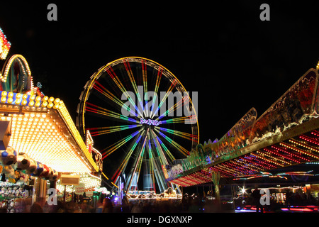 Fairground, ferris wheel, many lights, amusement park at night, marksmen's festival, Biberach, Upper Swabia, Baden-Wuerttemberg Stock Photo