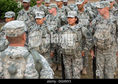 Women Drill Sergeant candidates at the US Army Drill Instructors School Fort Jackson stand at attention September 26, 2013 in Columbia, SC. While 14 percent of the Army is women soldiers there is a shortage of female Drill Sergeants. Stock Photo