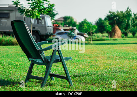 Mobile Home; Camping; chair;Car; Tent; Summer; Holiday; Vacations; Park; Travel Destinations; Field; Travel; Grass; Stock Photo