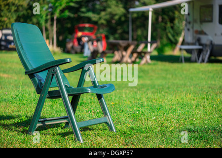 Mobile Home; Camping; chair;Car; Tent; Summer; Holiday; Vacations; Park; Travel Destinations; Field; Travel; Grass; Stock Photo