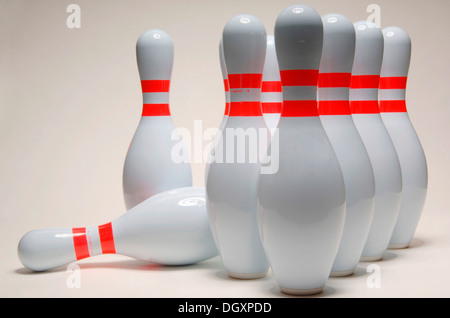 Set up bowling pins with one fallen over Stock Photo