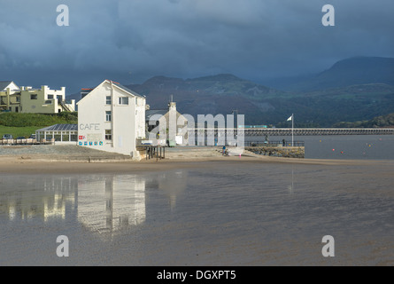 Barmouth harbour scene with train crossing the famous Barmouth Bridge Stock Photo