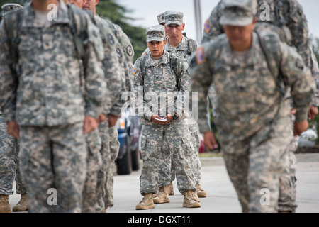 Male and female Drill Sergeant candidates at the US Army Drill Instructors School Fort Jackson during formation September 26, 2013 in Columbia, SC. While 14 percent of the Army is women soldiers there is a shortage of female Drill Sergeants. Stock Photo