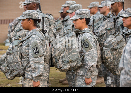 Male and female Drill Sergeant candidates at the US Army Drill Instructors School Fort Jackson during formation September 26, 2013 in Columbia, SC. While 14 percent of the Army is women soldiers there is a shortage of female Drill Sergeants. Stock Photo