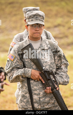 Women Drill Sergeant candidates at the US Army Drill Instructors School Fort Jackson listen during weapons training September 26, 2013 in Columbia, SC. While 14 percent of the Army is women soldiers there is a shortage of female Drill Sergeants. Stock Photo