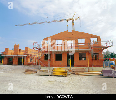 Single-family homes under construction, Sauerlach, Bavaria, Germany Stock Photo