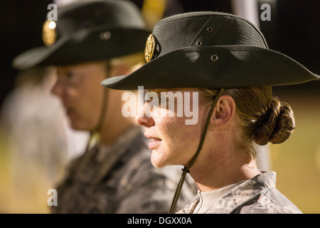 A woman Drill Sergeant instructor observes candidates at the US Army Drill Instructors School Fort Jackson September 27, 2013 in Columbia, SC. While 14 percent of the Army is women soldiers there is a shortage of female Drill Sergeants. Stock Photo