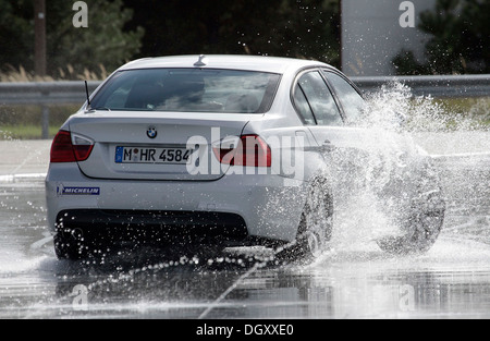 BMW driver safety training on wet asphalt in a BMW 3, Templin, Brandenburg Stock Photo