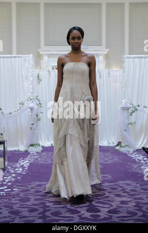 London, UK. 27th October 2013. Bridal designs by Monsylv at the Mahogany Bridal Show 2013 at The Grand Connaught Rooms in London. Credit: Elsie Kibue / Alamy Live News Stock Photo