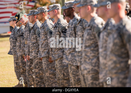 A female Drill Sergeant instructor observes candidates at the US Army Drill Instructors School Fort Jackson during close order drill exercises September 27, 2013 in Columbia, SC. While 14 percent of the Army is women soldiers there is a shortage of female Drill Sergeants. Stock Photo