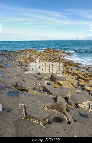 Natural phenomenon Giant's Causeway with hexagonal basalt blocks on the coast at Bushmill, County Antrim, Northern Ireland Stock Photo